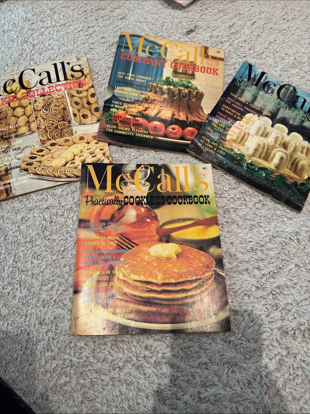 4 Vintage McCall’s soft covered cookbooks.